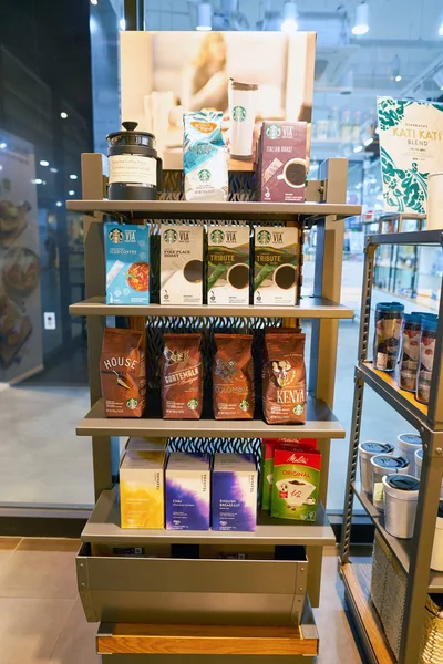 Goods on display at Starbucks coffee shop — Stock Photo, Image