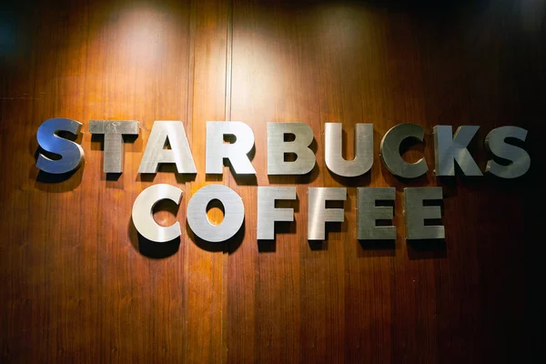 Starbucks podepsat. Starbucks Corporation — Stock fotografie