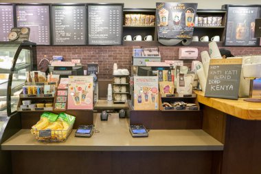 Starbucks coffee shop Busan, Busan, Güney Kore - Mayıs, 2017 yaklaşık: Satış alanı. Şirket ve kahvehane bir Amerikan kahve zinciri Starbucks kuruluştur.
