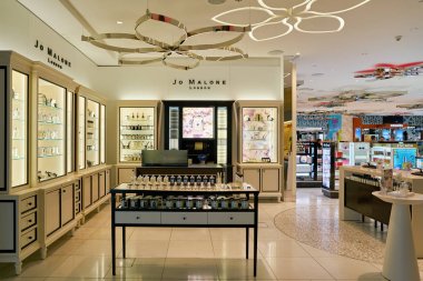 DOHA, QATAR - CIRCA MAY, 2017: Jo Malone store at Hamad International Airport of Doha. Jo Malone London is a British perfume and scented candle brand. clipart