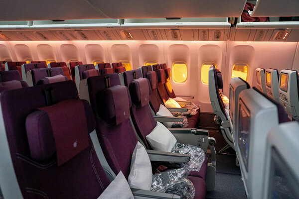 INCHEON, SOUTH KOREA - CIRCA JUNE, 2017: inside Qatar Airways Boeing 777. Qatar Airways, is the state-owned flag carrier of Qatar.