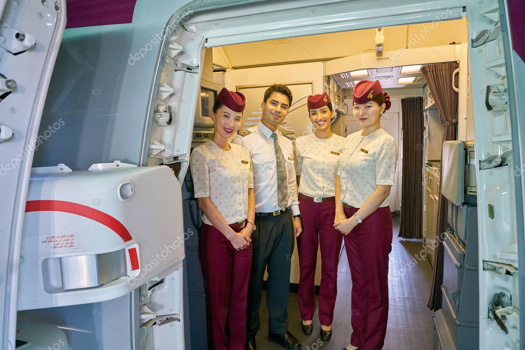 INCHEON, SOUTH KOREA - CIRCA MAY, 2017: Qatar Airways crew members on board of Boeing 777. Qatar Airways is the state-owned flag carrier of Qatar.