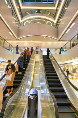 HONG KONG, CHINA - CIRCA JANUARY, 2019: escalators in New Town Plaza. New Town Plaza is a shopping mall, developed by Sun Hung Kai Properties, in the town centre of Sha Tin, Hong Kong.