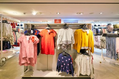 HONG KONG, CHINA - CIRCA JANUARY, 2019: interior shot of H&M store in Hong Kong. Hennes & Mauritz AB is a Swedish multinational clothing-retail company known for its fast fashion clothing.