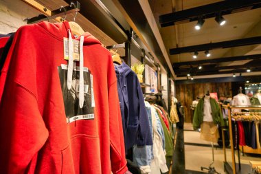 HONG KONG, CHINA - JANUARY 23, 2019: clothes on display at izzue store in New Town Plaza. New Town Plaza is a shopping mall in the town centre of Sha Tin, Hong Kong.