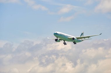 HONG KONG, CHINA - 04 JUNE, 2015: a Cathay Pacific Airbus A330 arrives at Hong Kong International Airport