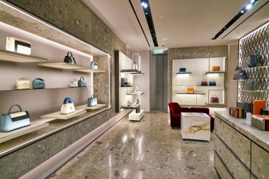 HONG KONG, CHINA - JANUARY 22, 2019: bags on display at Valextra store at ifc mall in Hong Kong. Valextra is a brand of luxury leather goods and accessories based in Milan, Italy.