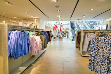 HONG KONG, CHINA - CIRCA JANUARY, 2019: interior shot of H&M store in Hong Kong. Hennes & Mauritz AB is a Swedish multinational clothing-retail company known for its fast fashion clothing.