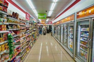 SINGAPORE - CIRCA APRIL, 2019: interior shot of 7-Eleven convenience store in Singapore. A convenience store is a small store that stocks a range of everyday items.