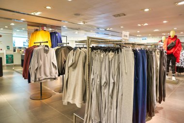 HONG KONG, CHINA - CIRCA JANUARY, 2019: interior shot of H&M store in Hong Kong. Hennes & Mauritz AB is a Swedish multinational clothing-retail company known for its fast fashion clothing.