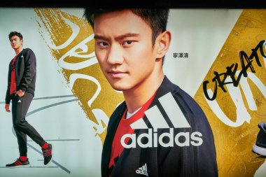 HONG KONG, CHINA - JANUARY 23, 2019: close up shot of Adidas advertisement poster seen in Hong Kong