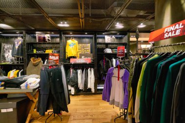 HONG KONG, CHINA - JANUARY 23, 2019: clothes on display at izzue store in New Town Plaza. New Town Plaza is a shopping mall in the town centre of Sha Tin, Hong Kong.