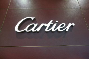 DUBAI, UAE - CIRCA JANUARY 2019: close up shot of Cartier sign Dubai International Airport.