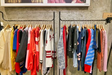 HONG KONG, CHINA - JANUARY 23, 2019: clothes on display at a store in New Town Plaza. New Town Plaza is a shopping mall in the town centre of Sha Tin, Hong Kong.