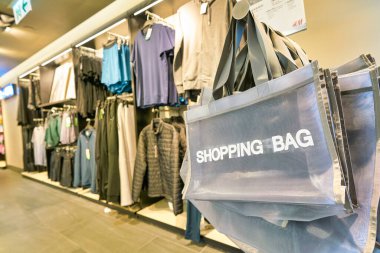 HONG KONG, CHINA - CIRCA JANUARY, 2019: interior shot of H&M store in Hong Kong. Hennes & Mauritz AB is a Swedish multinational clothing-retail company known for its fast fashion clothing.