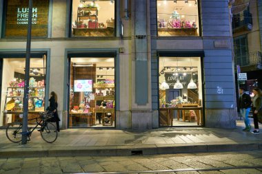 MILAN, ITALY - CIRCA NOVEMBER, 2017: Lush storefront in Milan at nighttime.