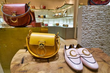 HONG KONG, CHINA - JANUARY 22, 2019: Chloe handbags and shoes on display at a store at ifc mall in Hong Kong.