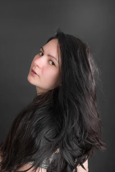 Woman with long dark hair — Stock Photo, Image