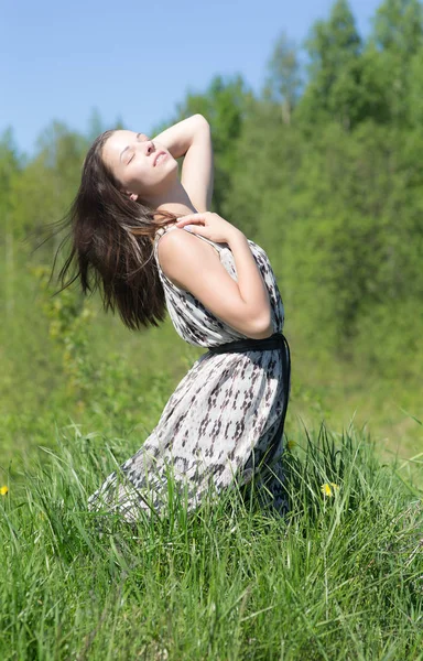 Sensual girl on green grass — Stock Photo, Image