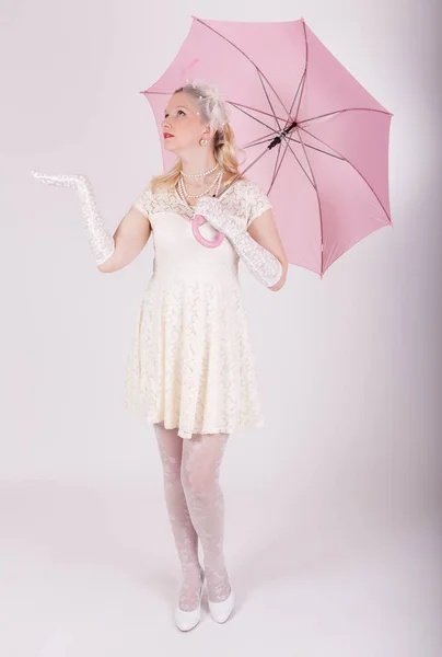 Girl with pink umbrella — Stock Photo, Image