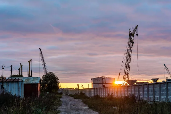 Site de construction au coucher du soleil — Photo