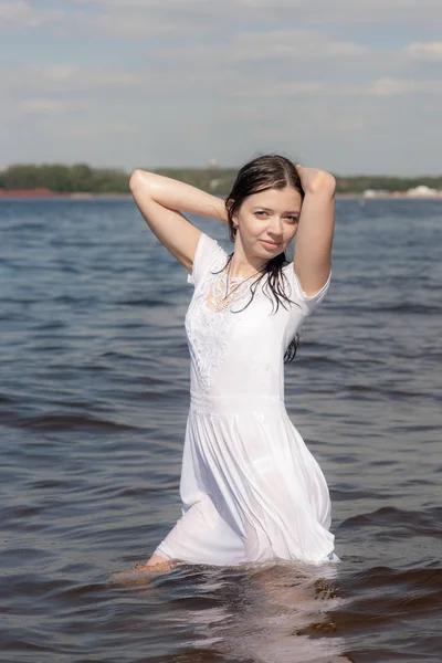 Sensual girl in white dress — Stok fotoğraf