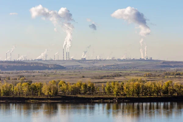 Petrochemical plants and autumn river — Stock Photo, Image