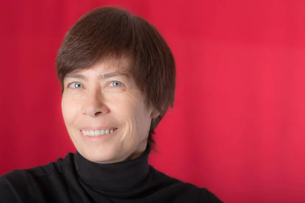 Woman on a red background — Stock Photo, Image