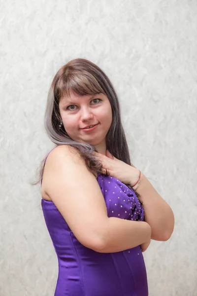 Girl in a purple dress — Stock Photo, Image