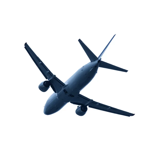 Avião de passageiros voando sobre um fundo branco — Fotografia de Stock