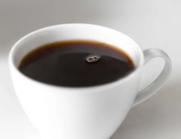 Cup of coffee or strong tea close up — Stock Photo, Image