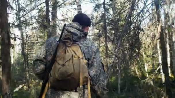 Man hunter outdoor in forest hunt alone — Stok Video