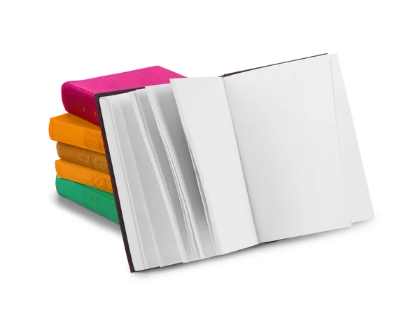 Livro aberto sobre pilha de fundo de livros em branco isolado — Fotografia de Stock