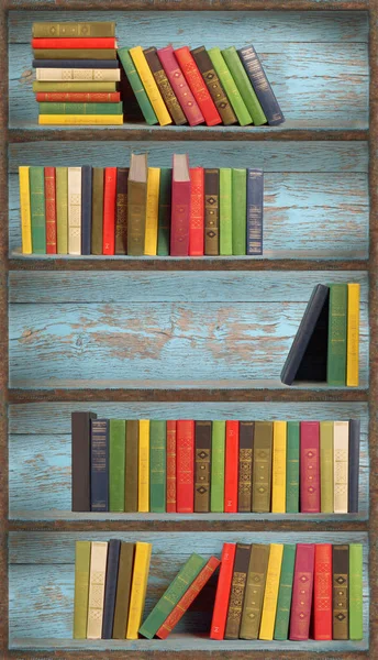 Old literary shelf with old books — Stock Photo, Image