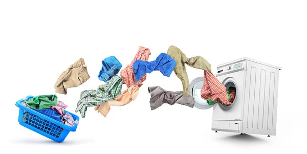 Vêtements volent hors du panier dans la machine à laver isolat — Photo