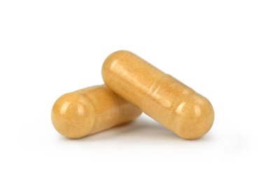 Beyaz arka plan üzerinde izole renkli hapları