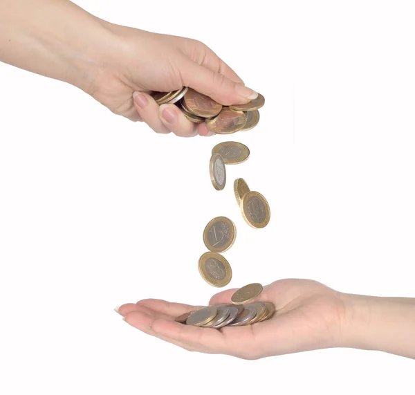 Coins fall from hand to hand isolated — Stock Photo, Image