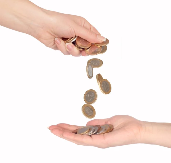 Coins fall from hand to hand isolated — Stock Photo, Image