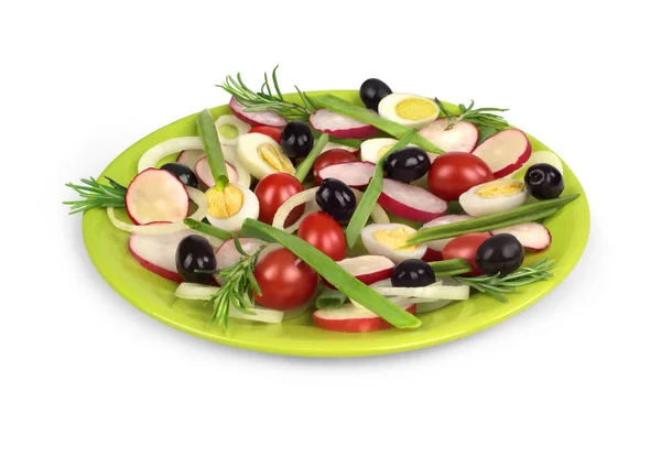 Verduras en un plato verde claro sobre un fondo blanco — Foto de Stock