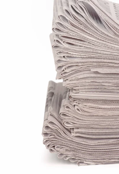 Ein Stapel gefalteter Zeitungen — Stockfoto
