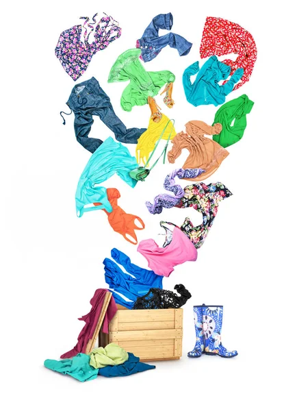 Flying clothes.The box into which clothes fall. — Stock Photo, Image