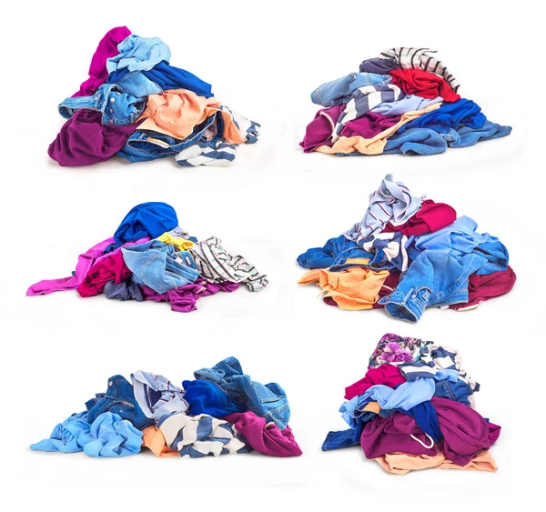 Set of heaps of clothes. On a white background there are several — Stock Photo, Image