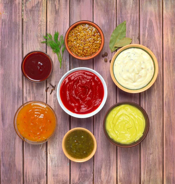 Sauces set on a wooden background, top view — Stock Photo, Image