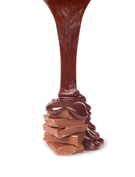 Beyaz zemin üzerine eritilmiş çikolata — Stok fotoğraf