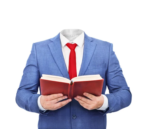 Hombre de traje sosteniendo un libro abierto sobre un fondo blanco —  Fotos de Stock
