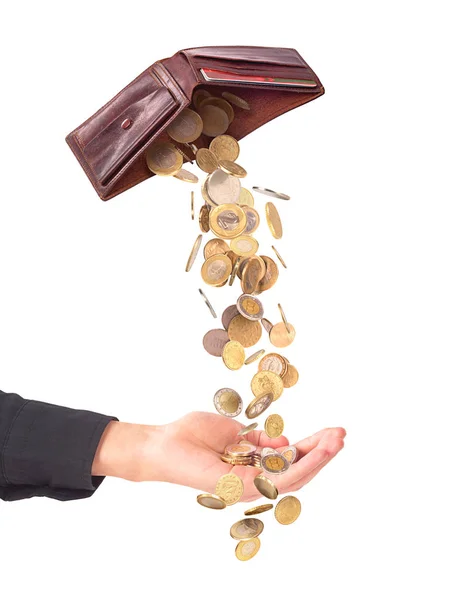 Vereinzelte Hand voll fallenden Geldes aus der Brieftasche. Unternehmenskonzept — Stockfoto