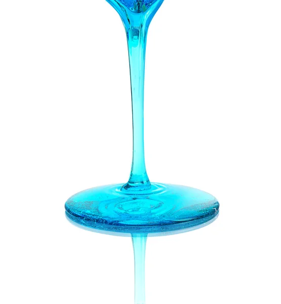 Blue liquid that pours on the glass surface — Stock Photo, Image