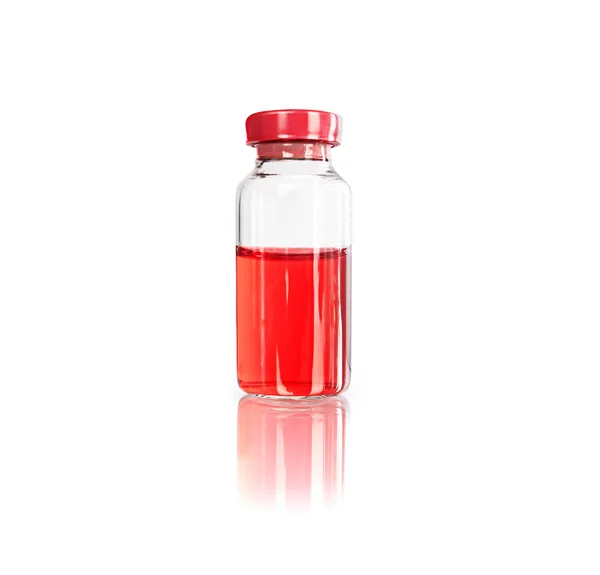 Glass jar with red liquid isolated on white background — Stock Photo, Image