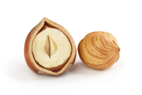 Hazelnuts broken on a white background — Stock Photo, Image