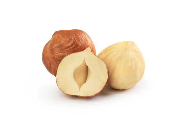 Peeled hazelnuts on a white background — Stock Photo, Image